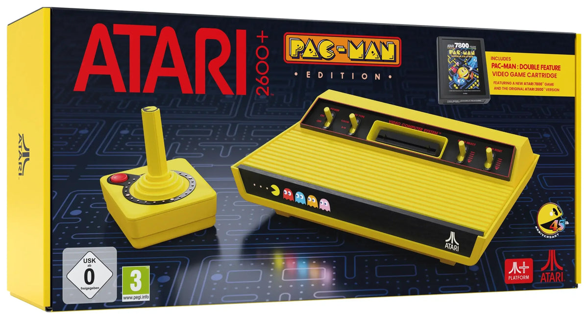 Konsola Atari 2600+ Pac-Man Edition z żółtym joystickiem i kasetą gier, idealna dla fanów retro gamingu i kolekcjonerów.