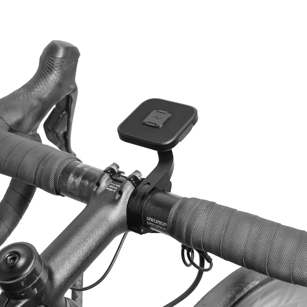 Czarny uchwyt na kierownicę roweru z magnetycznym złączem, idealny do telefonu lub GPS.