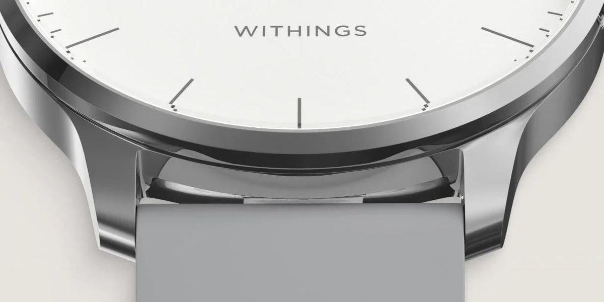 Zegarek Withings z białą tarczą i szarym paskiem, elegancki design do biura i codziennego użytku